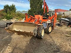 Kubota R310 met backhoe