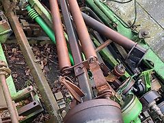 John Deere prasa - oś kompletna (Części zamienne)
